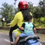 Helmet And Safety Harness For Children On Two-Wheelers |