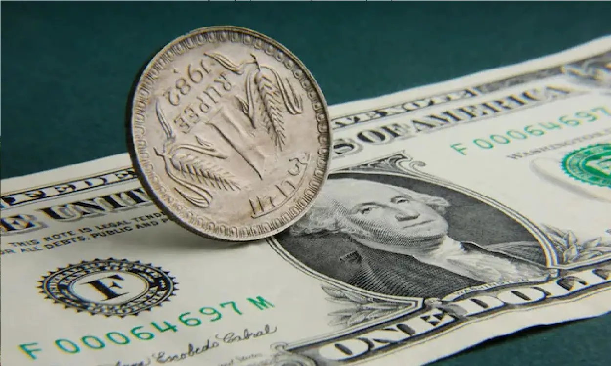 Rupee plunges to record low against dollar